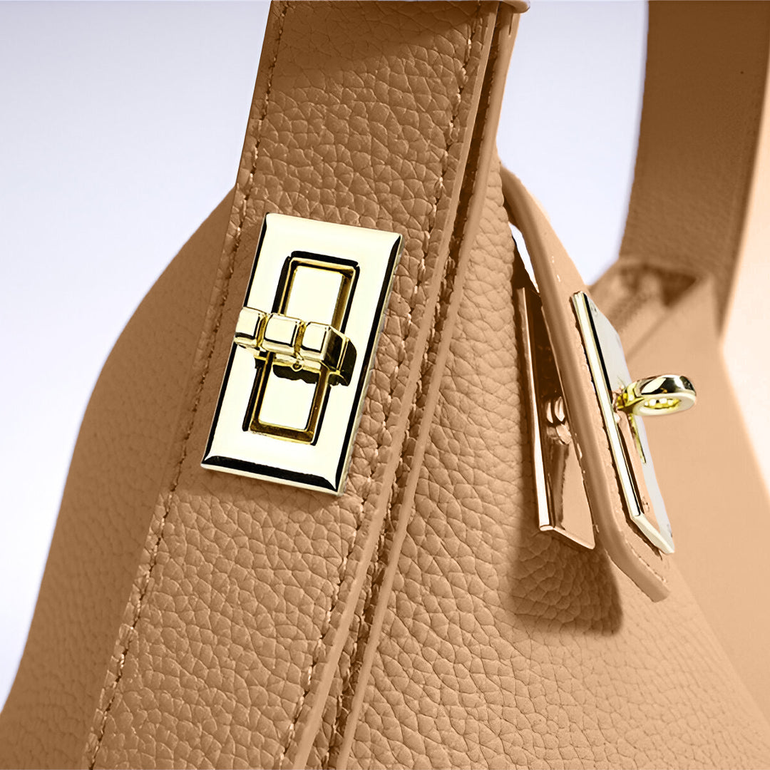 Delia - Sculpted Lock Shoulder Bag